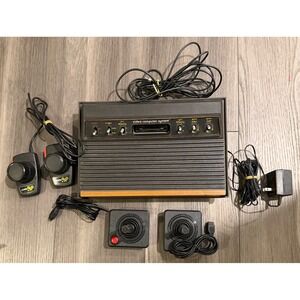 Atari 2600 VCS Console Woodgrain CX-2600 6-Switch Joysticks Paddles Power Bundle